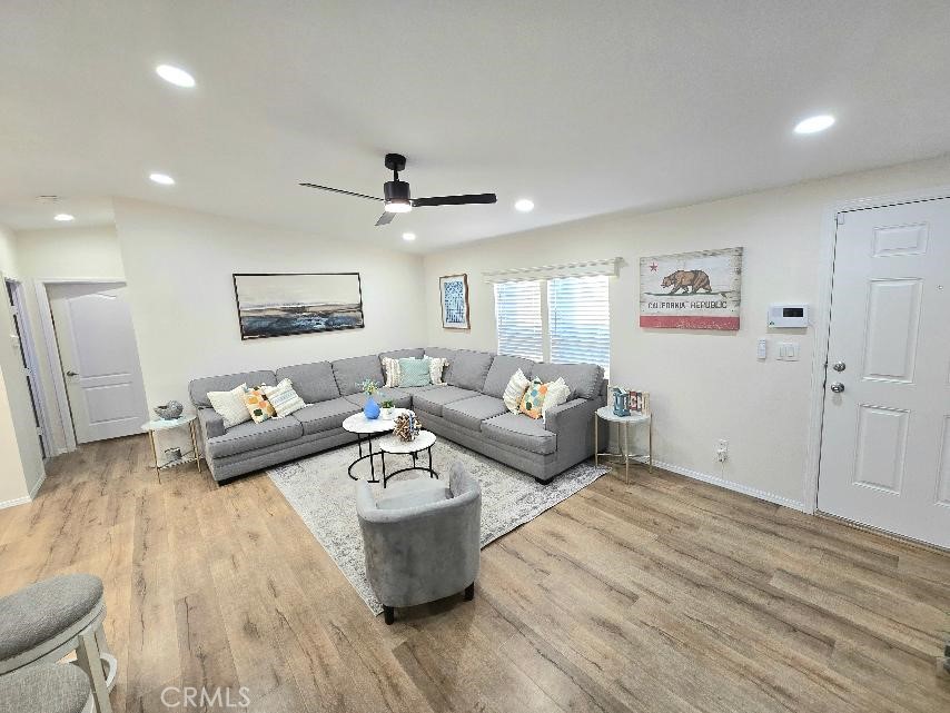 Living room - 21851 Newland St. 43, Huntington Beach CA 92646 - photo 6