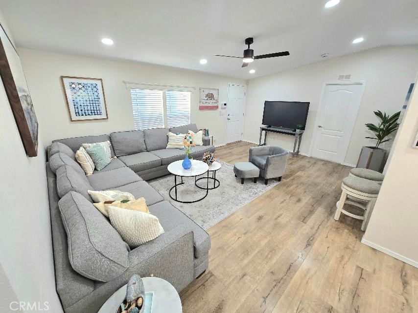 Living room - 21851 Newland St. 43, Huntington Beach CA 92646 - photo 7
