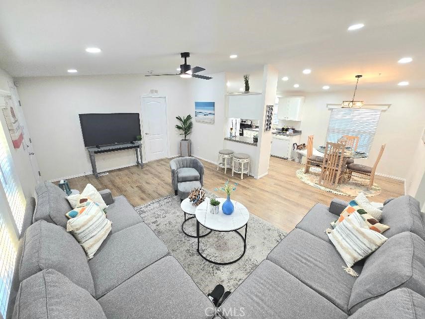 Living room - 21851 Newland St. 43, Huntington Beach CA 92646 - photo 8