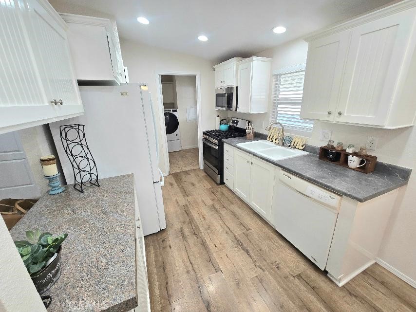 Kitchen - 21851 Newland St. 43, Huntington Beach CA 92646 - photo 10