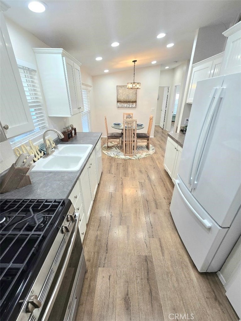 Kitchen - 21851 Newland St. 43, Huntington Beach CA 92646 - photo 12