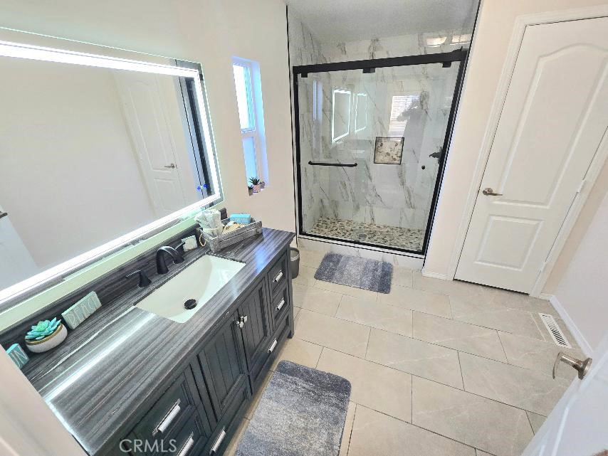 Upgraded Master Bathroom - 21851 Newland St. 43, Huntington Beach CA 92646 - photo 24