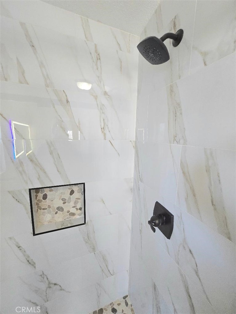 MUpgraded aster Bathroom - 21851 Newland St. 43, Huntington Beach CA 92646 - photo 28