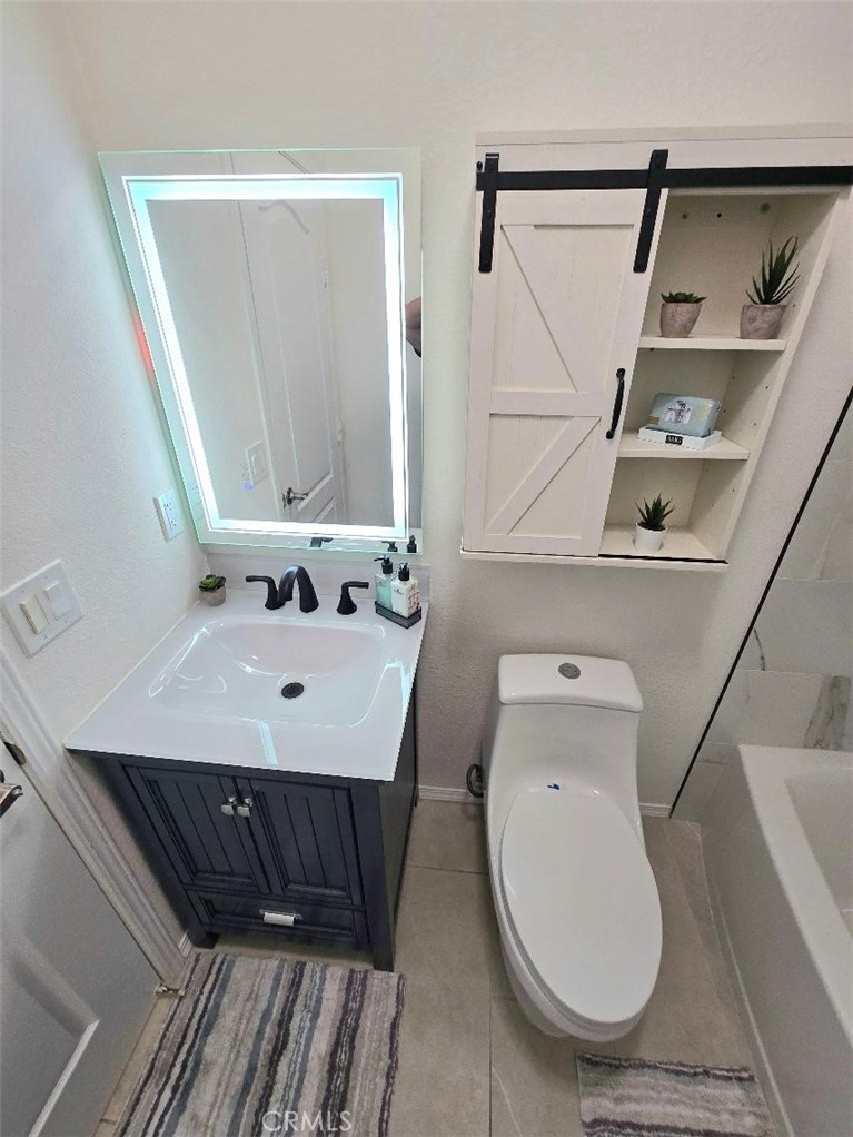 2nd. upgraded bathroom - 21851 Newland St. 43, Huntington Beach CA 92646 - photo 38