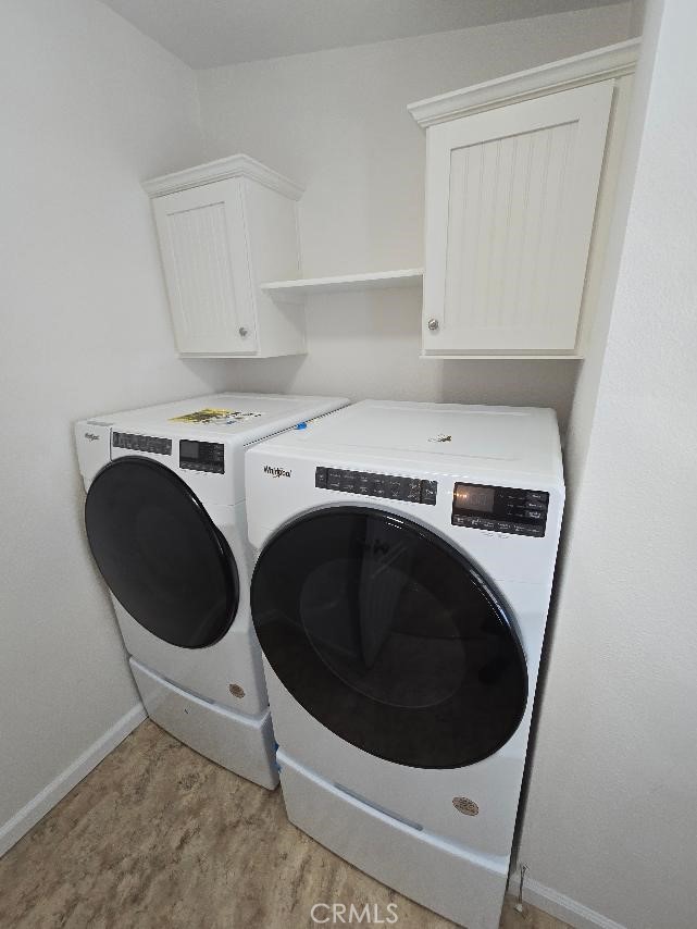 separate laundry room Washer and dryer - 21851 Newland St. 43, Huntington Beach CA 92646 - photo 44