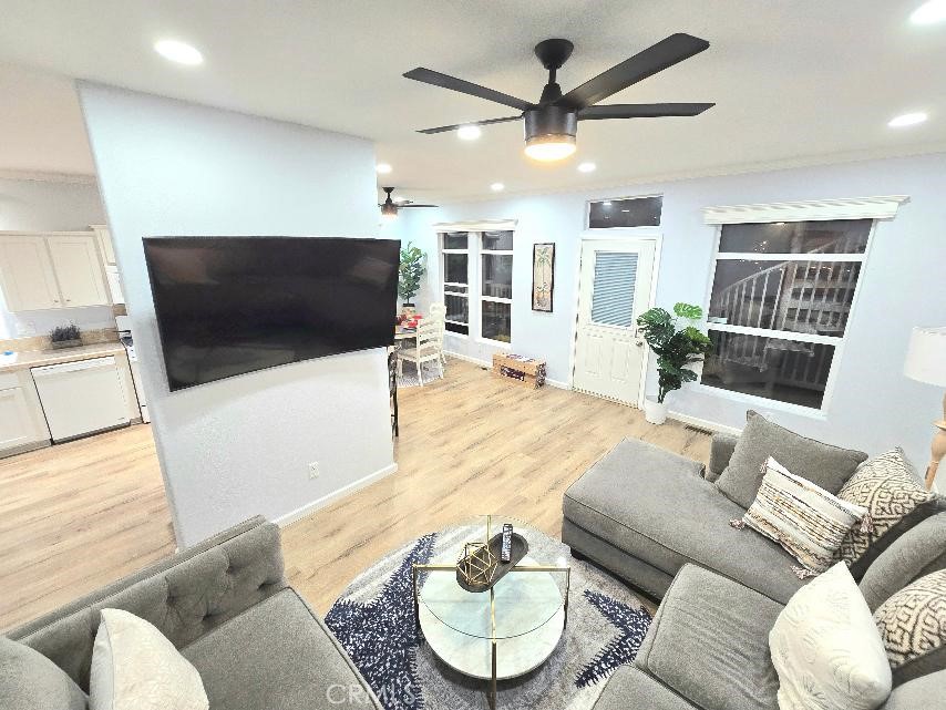 living room - 21851 Newland St 66, Huntington Beach CA 92646 - photo 19