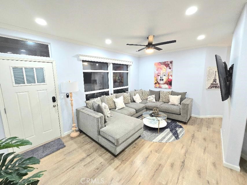 living room - 21851 Newland St 66, Huntington Beach CA 92646 - photo 20