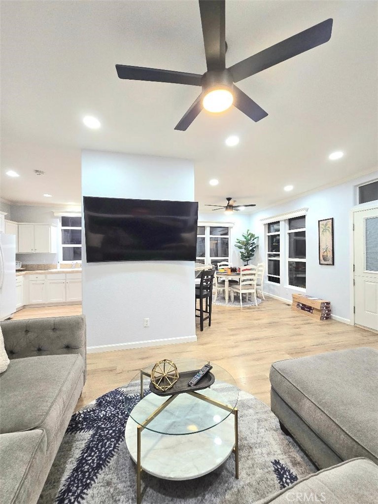 living room - 21851 Newland St 66, Huntington Beach CA 92646 - photo 21