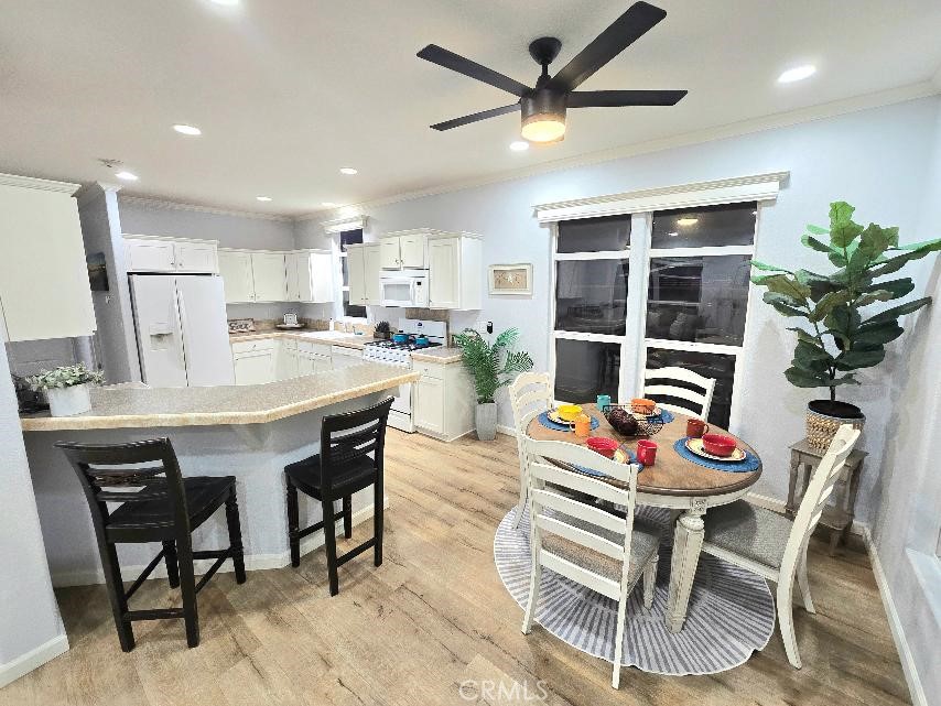 dining room / Bar - 21851 Newland St 66, Huntington Beach CA 92646 - photo 24