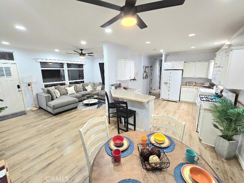 dining room - 21851 Newland St 66, Huntington Beach CA 92646 - photo 25