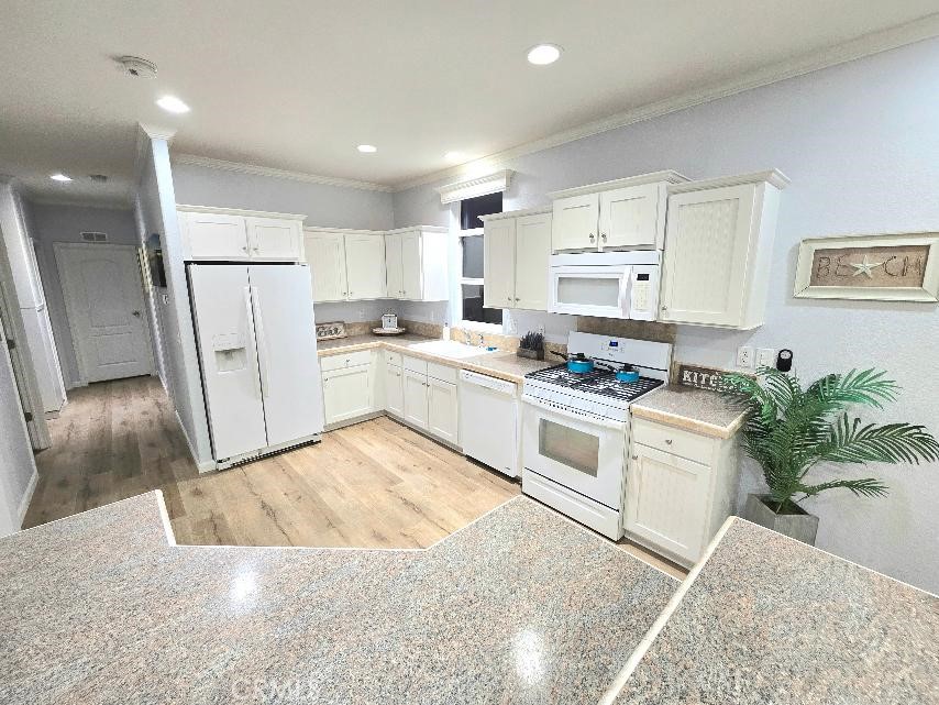 Kitchen - 21851 Newland St 66, Huntington Beach CA 92646 - photo 26