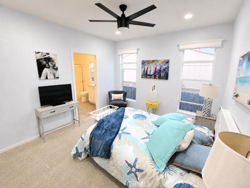Master bedroom - 21851 Newland St 66, Huntington Beach CA 92646 - photo 34