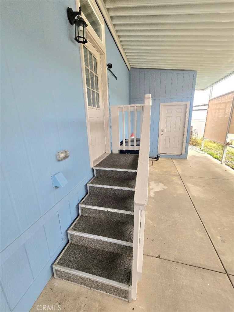 carport side entrance - 21851 Newland St 66, Huntington Beach CA 92646 - photo 50