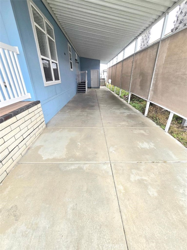 3-car private carport - 21851 Newland St 66, Huntington Beach CA 92646 - photo 51