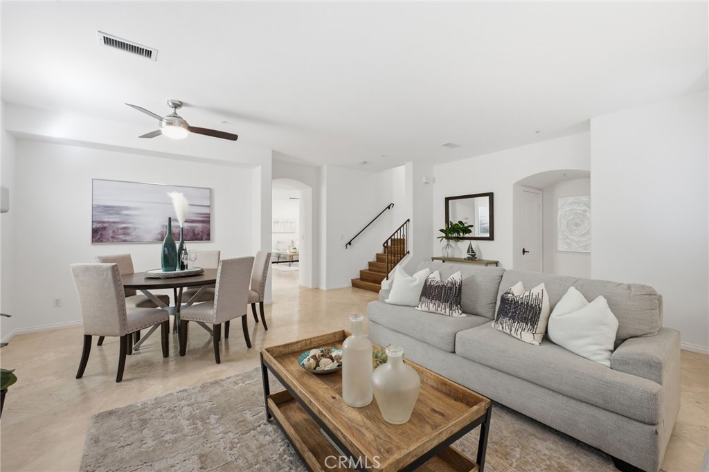 Welcome to the spacious 328 5th St. In Huntington Beach. Here is the spacious living room/dining room with a peek of the - 328 5th street, Huntington Beach CA 92648 - photo 1