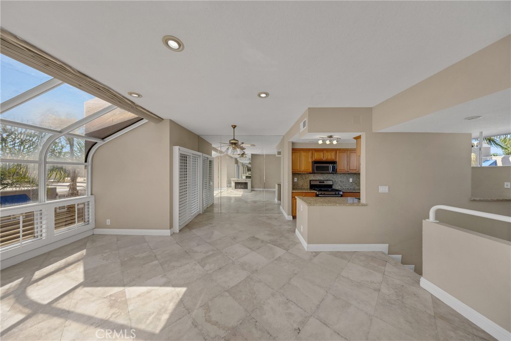 The kitchen has been opened up and is an ideal place to entertain. - 3361 Tempe, Huntington Beach CA 92649 - photo 15