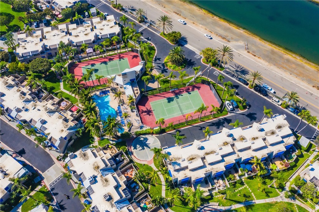Community amenities include two tennis courts, a pool and spa. - 3361 Tempe, Huntington Beach CA 92649 - photo 28
