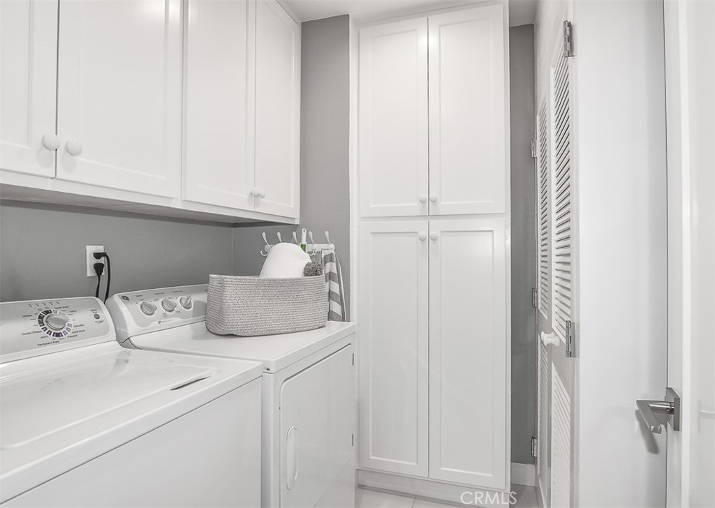 laundry room, lots of storage - 3532 Windspun Drive, Huntington Beach CA 92649 - photo 29