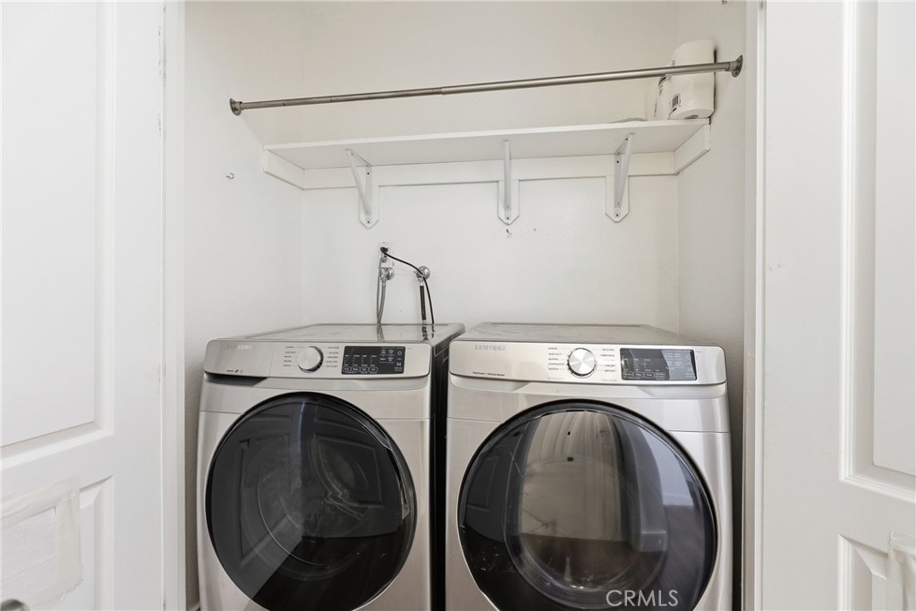 Main level laundry closet with Samsung Front load washer and gas dryer - 3631 Windspun Drive Drive, Huntington Beach CA 92649 - photo 15