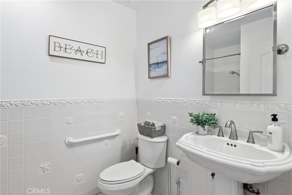 main level 3/4 bath adjacent to bedroom. - 3631 Windspun Drive Drive, Huntington Beach CA 92649 - photo 16