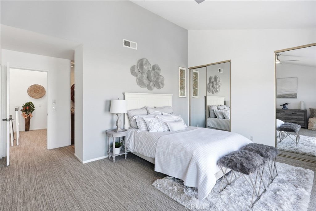 Shown with a queen-size bed, this spacious bedroom easily accommodates a king-size bed with room to spare! - 3631 Windspun Drive Drive, Huntington Beach CA 92649 - photo 25