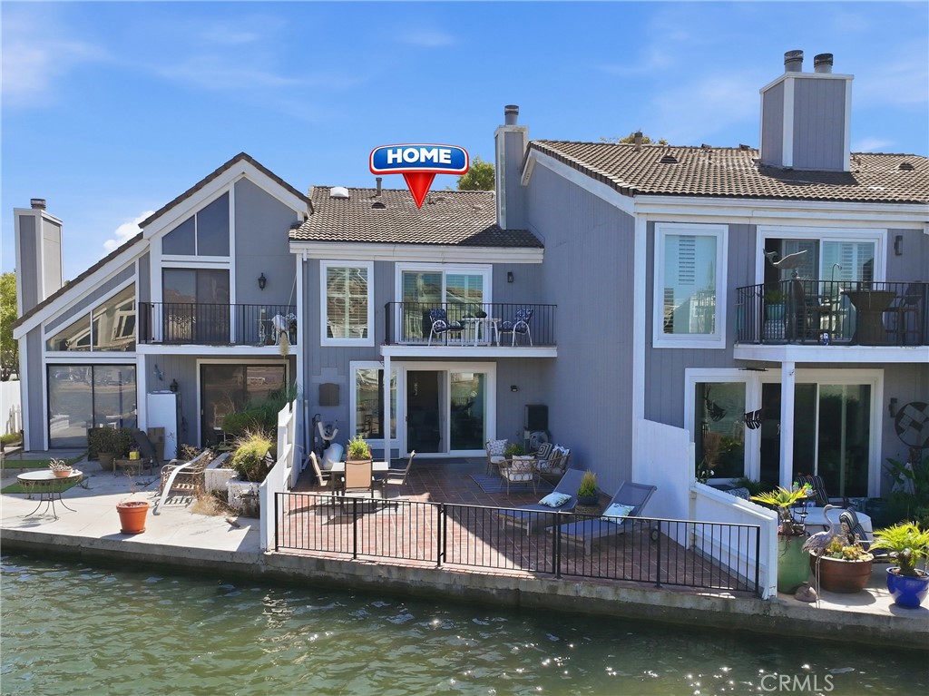 Wrought iron fencing surrounds the back patio, providing added safety and security while preserving the beautiful bay vi - 3631 Windspun Drive Drive, Huntington Beach CA 92649 - photo 39