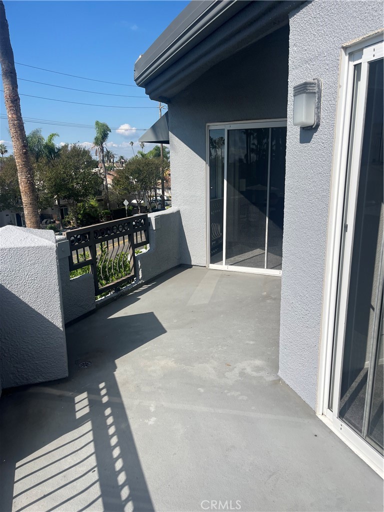 Large wrap around patio to enjoy the sunsets! - 420 Lake Street 302, Huntington Beach CA 92648 - photo 16