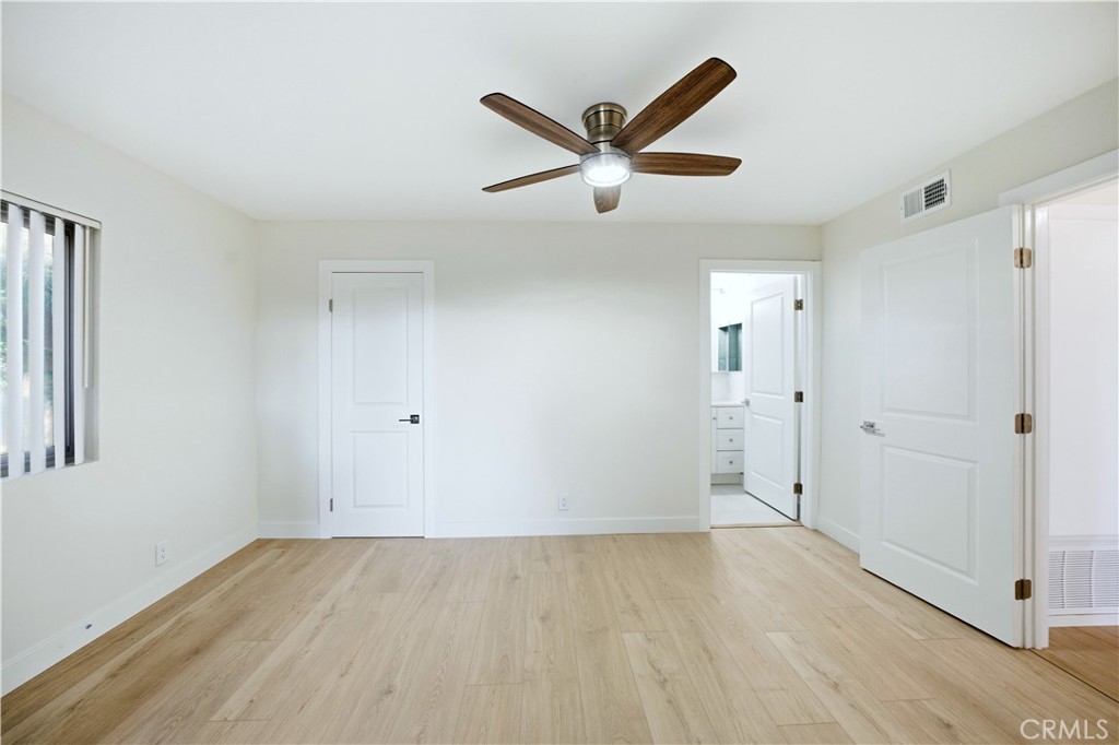 Primary Bed and remodeled bath - 421 Coral Reef, Huntington Beach CA 92648 - photo 18