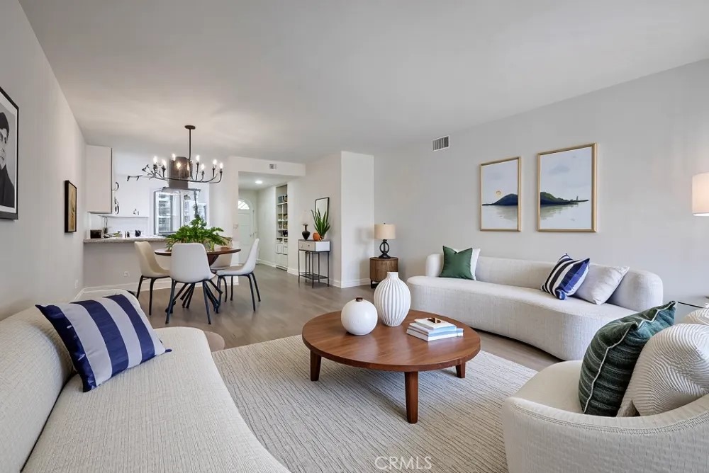 Living Room with Virtual Staging Furnishings - 4682 Warner B102, Huntington Beach CA 92649 - photo 1