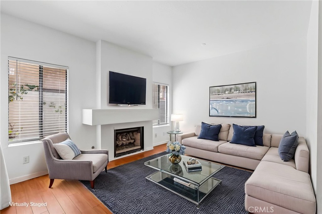Virtually Staged - 4752 Tiara Drive 103, Huntington Beach CA 92649 - photo 1