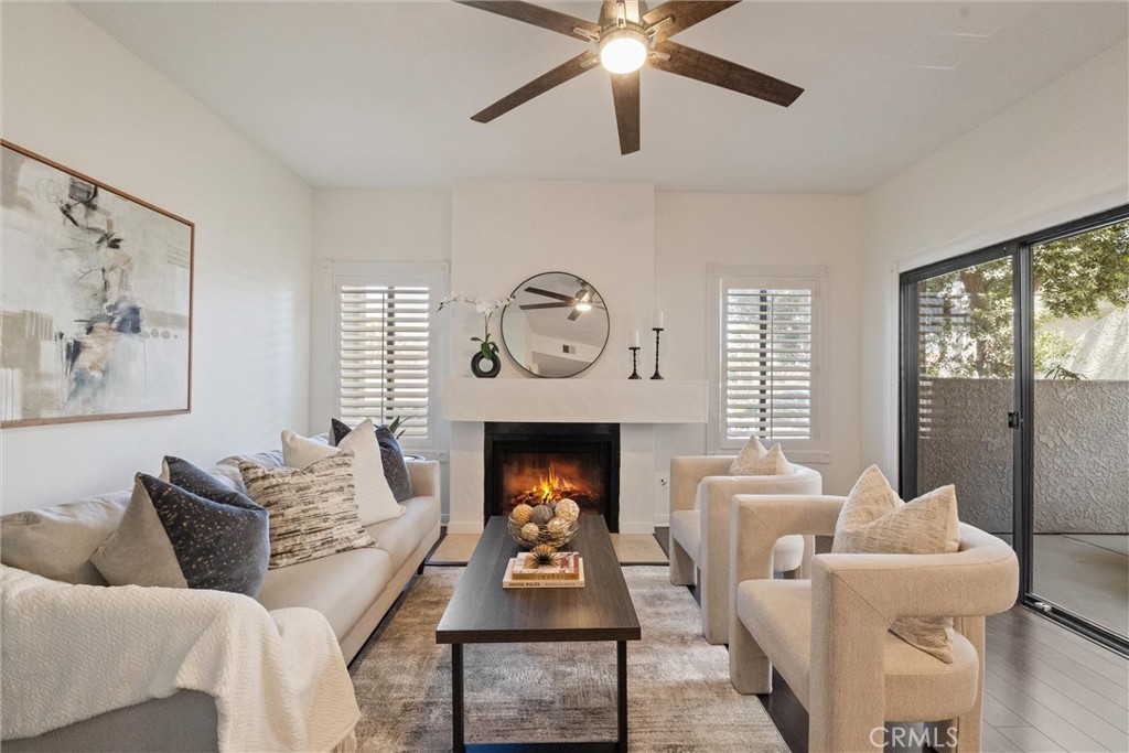 Fireplace virtually enhanced - 4782 Tiara Dr. 104, Huntington Beach CA 92649 - photo 1