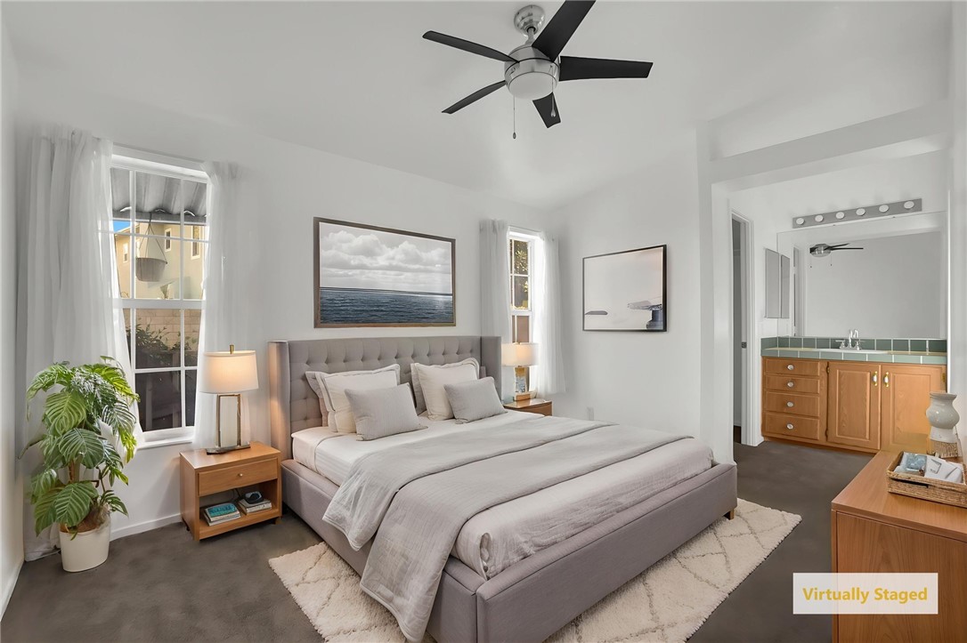 Master Bedroom with virtual staging - 5200 Heil Avenue 28, Huntington Beach CA 92649 - photo 9