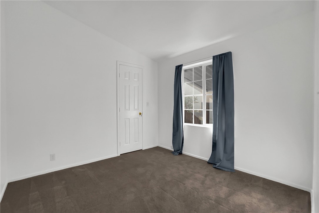 2nd Bedroom without furniture - 5200 Heil Avenue 28, Huntington Beach CA 92649 - photo 11