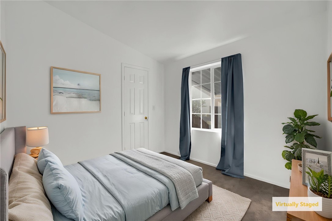 2nd bedroom with virtual staging - 5200 Heil Avenue 28, Huntington Beach CA 92649 - photo 12