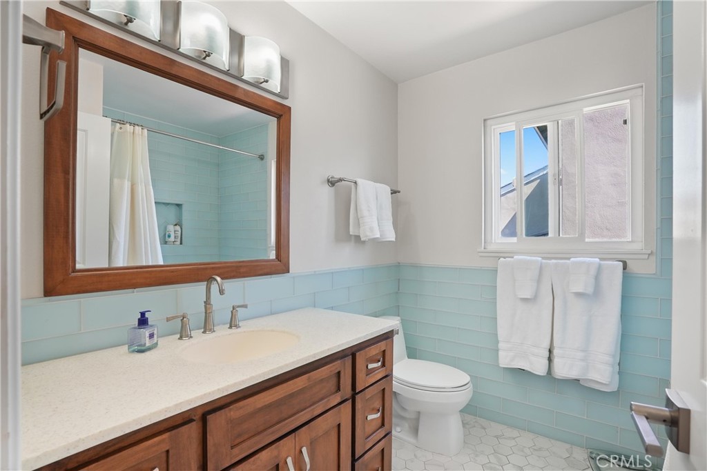 Upgraded Secondary Bath - 5771 Grimsby Drive, Huntington Beach CA 92649 - photo 45