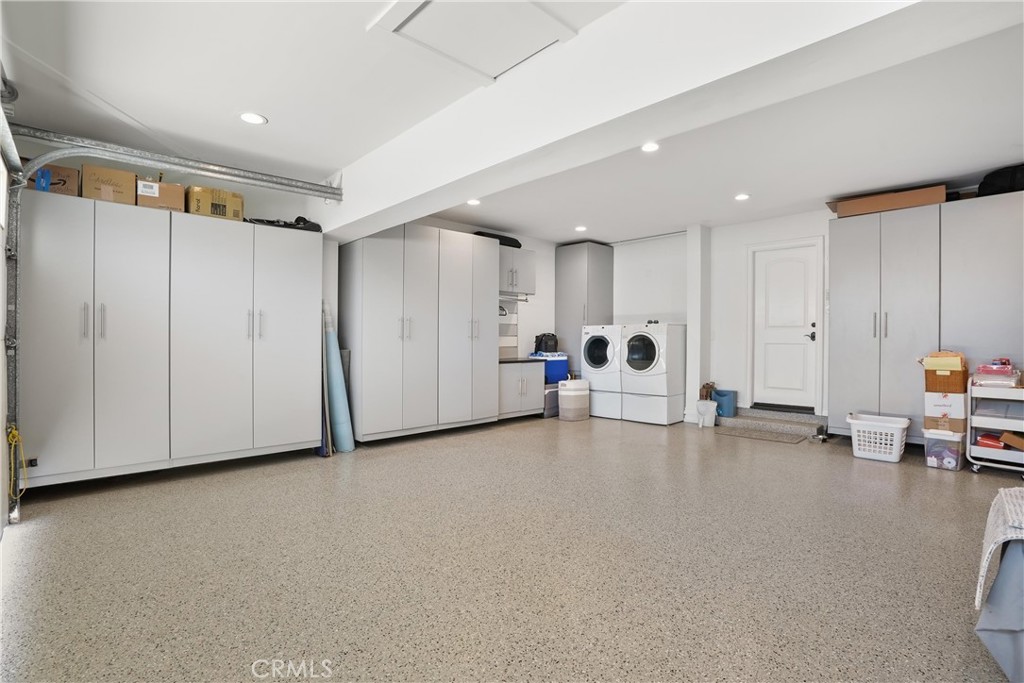 Expanded ~3 Car Garage has Custom Cabinets, Epoxy Floors - 5771 Grimsby Drive, Huntington Beach CA 92649 - photo 47