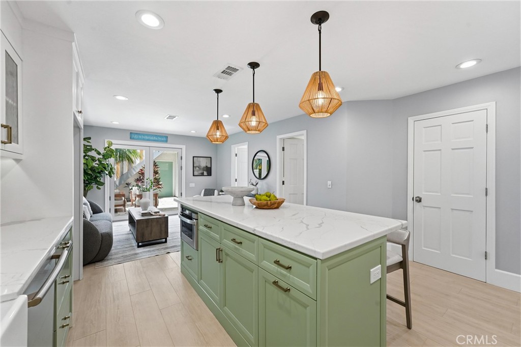 Kitchen new fixtures and oven hood - 613 9th, Huntington Beach CA 92648 - photo 8