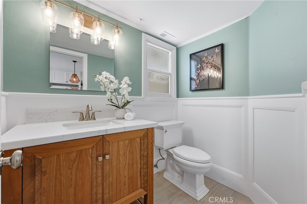 Downstairs powder room - 613 9th, Huntington Beach CA 92648 - photo 14