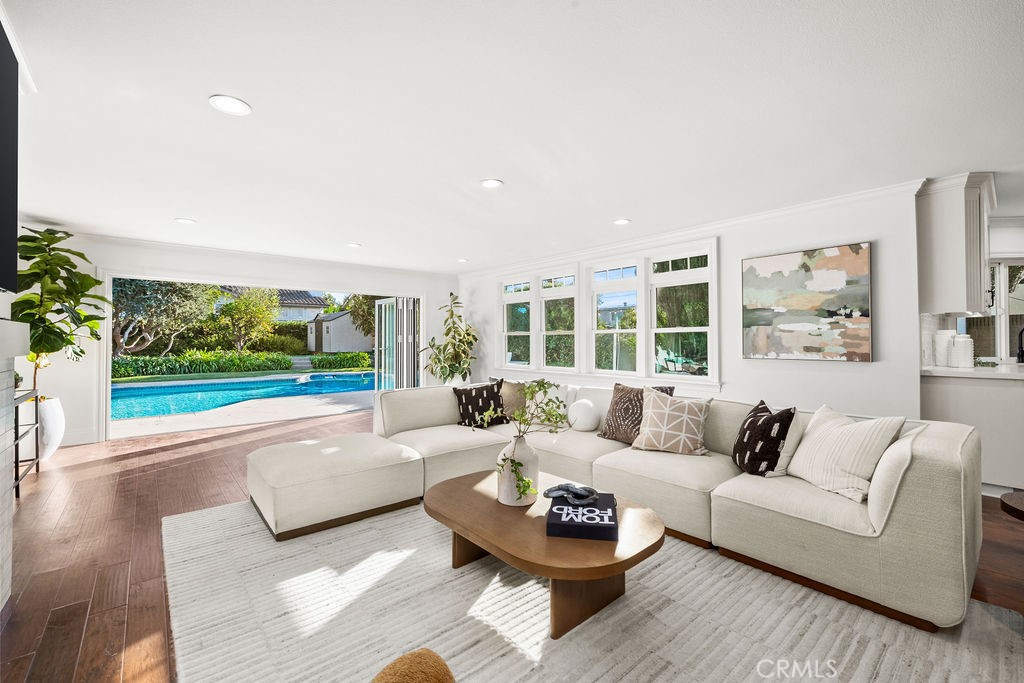 Incredible Family/Great room with Bifold Doors to Lush Backyard and Sparkling Pool - 6402 Athena Drive, Huntington Beach CA 92647 - photo 8