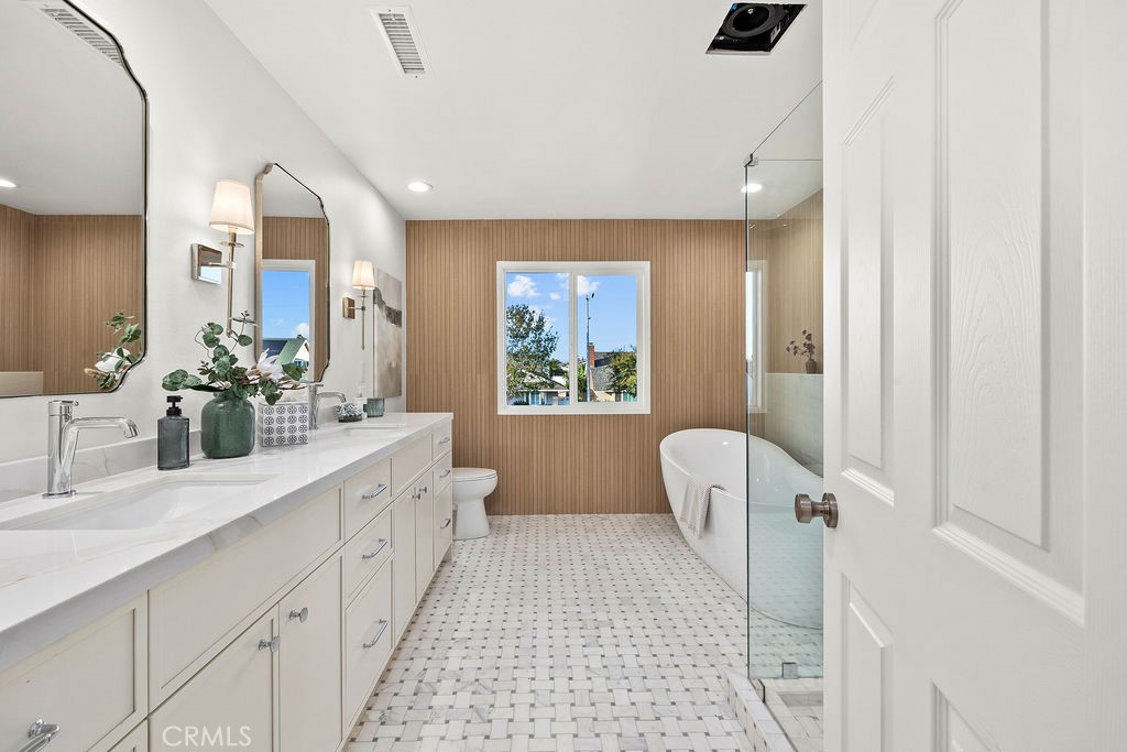 Ensuite Primary Bathroom with Tub and Shower - 6402 Athena Drive, Huntington Beach CA 92647 - photo 23