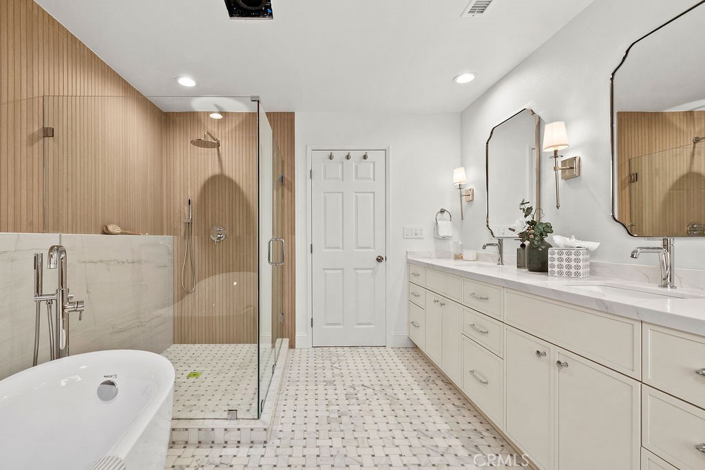 Beautifully remodeled Primary Bathroom with Custom Tile and Dual Sinks Countertop - 6402 Athena Drive, Huntington Beach CA 92647 - photo 24