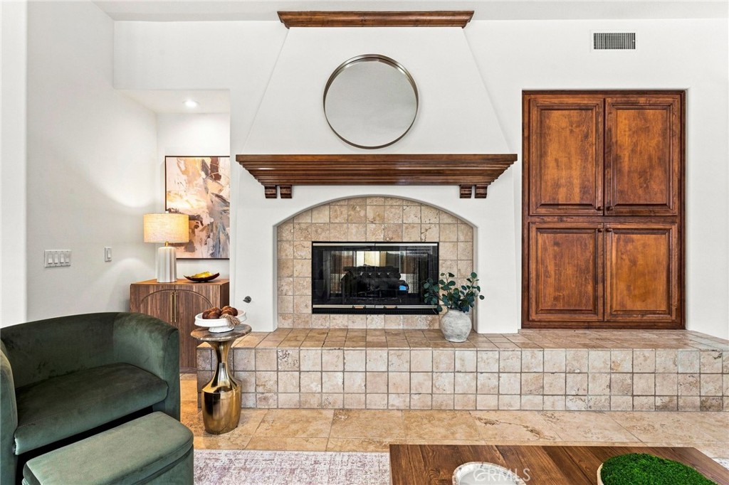 Double sided fireplace - 6416 Setting Sun Drive, Huntington Beach CA 92648 - photo 23
