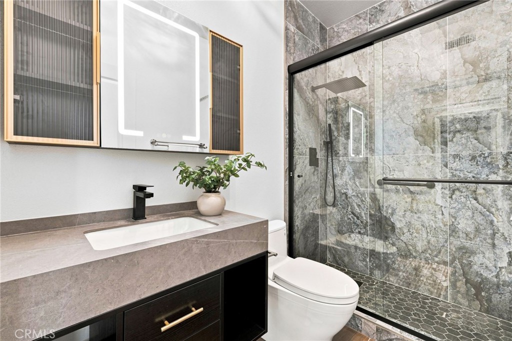 Attached bathroom for Bedroom 3 - 6416 Setting Sun Drive, Huntington Beach CA 92648 - photo 49
