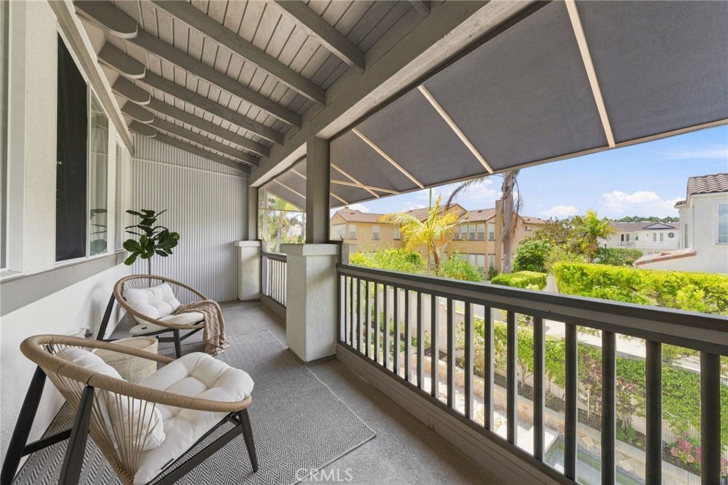 Private screened balcony off the primary bedroom - 6416 Setting Sun Drive, Huntington Beach CA 92648 - photo 59