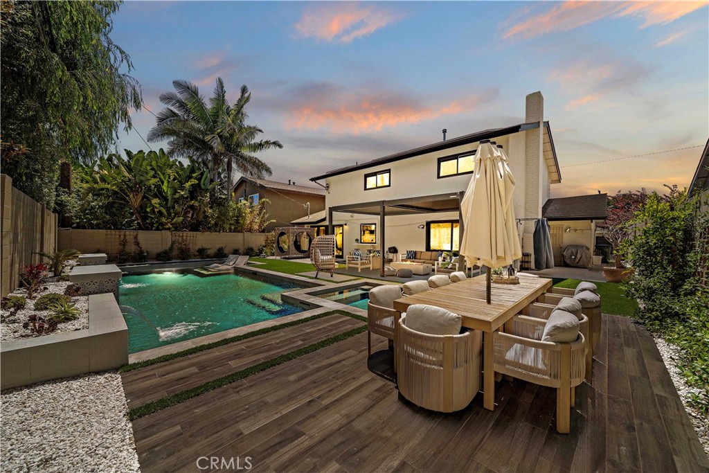 Paradise Found!! Entertainers dream with brand-new Pebble Tec saltwater pool & spa w/Baja shelf & waterfalls, natural st - 6431 Reubens Drive, Huntington Beach CA 92647 - photo 1