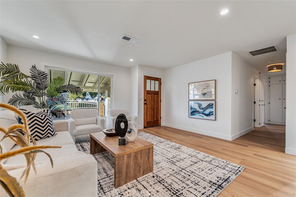 Living room, front door, hallway - 6502 Clare Drive, Huntington Beach CA 92647 - photo 5