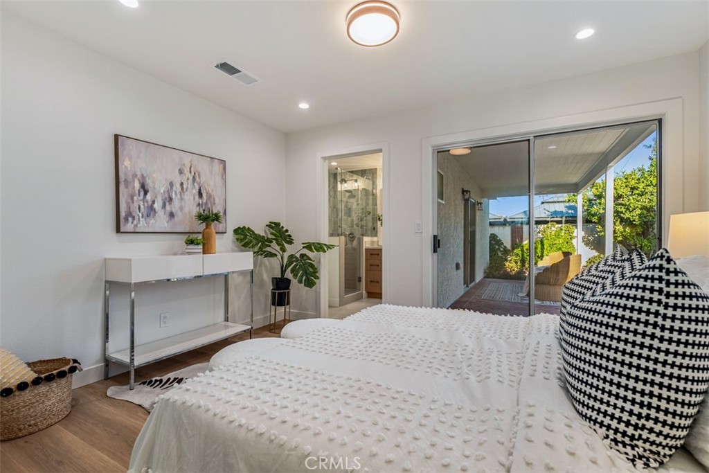 Guest bedroom, en-suite bathroom, slider to back patio - 6502 Clare Drive, Huntington Beach CA 92647 - photo 14