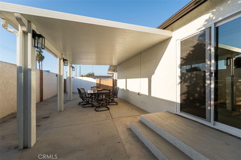 Side Yard / Patio / Slider door to kitchen - 6502 Clare Drive, Huntington Beach CA 92647 - photo 22