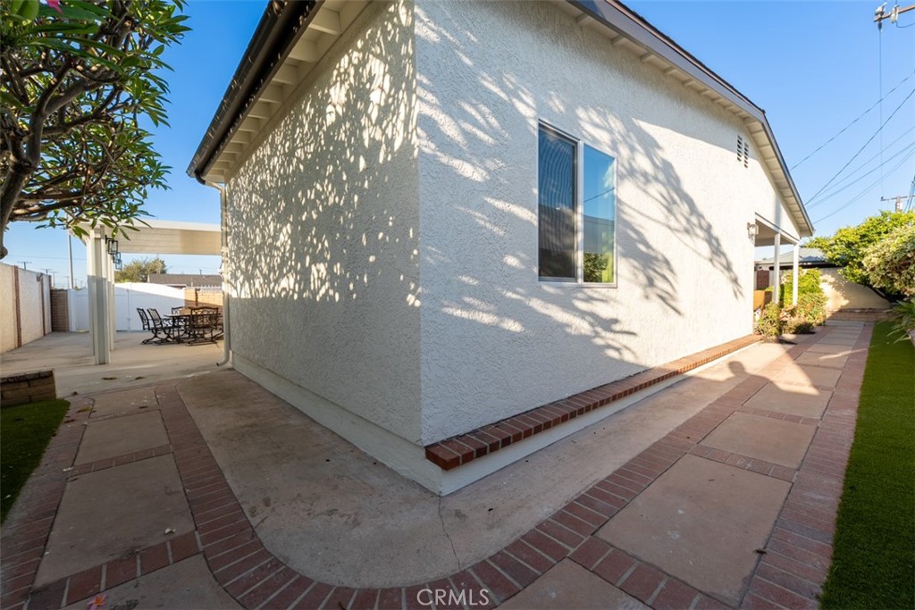 View of side yard and backyard - 6502 Clare Drive, Huntington Beach CA 92647 - photo 23