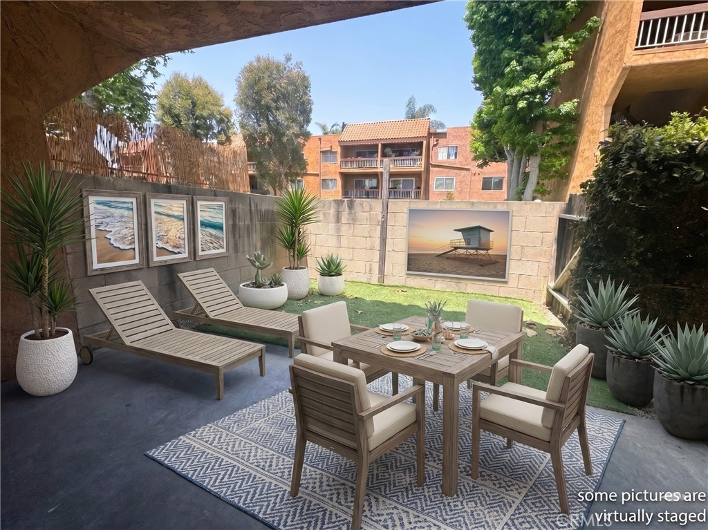 Great 1 bedroom, 1 bath, 754 sq foot down unit 2 miles from the beach, gated community, 1 carport, large rooms and a fan - 6600 Warner 115, Huntington Beach CA 92647 - photo 1